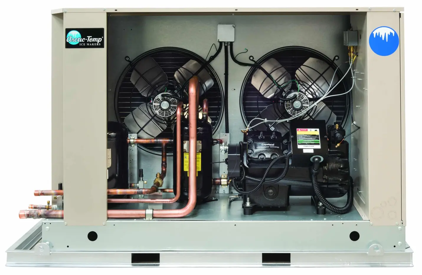 Arctic-Temp® condensing unit with two fans, compressors and copper piping, front panel open